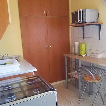 Dina Apartman Gazde/Camere de închiriat *